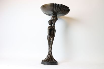 null Young woman in long dress supporting a large cup, bronze sculpture of Art Nouveau...