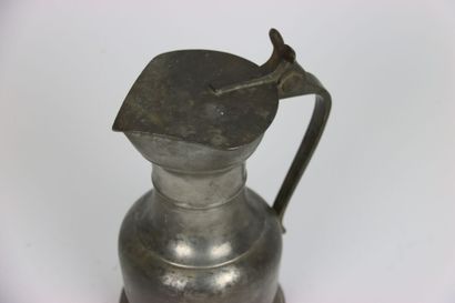 null LAUSANNE - Pewter shoulder pitcher with buds, hallmark on the lid: lion passant...