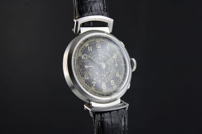 null ARSA 1940s
Montre chronographe bracelet en acier. Boitier rond avec anses articulées...