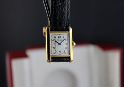 null CARTIER Tank Must
Bracelet watch in silver gilt. Rectangular case. Back with...