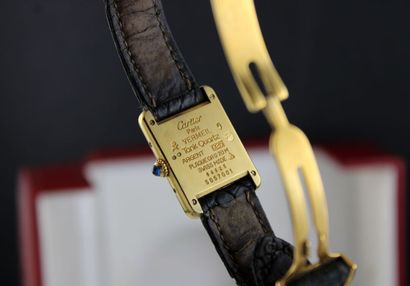 null CARTIER Tank Must
Bracelet watch in silver gilt. Rectangular case. Back with...