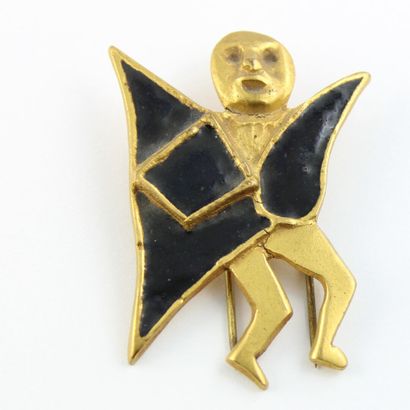 null Line VAUTRIN (1913-1997)
Broche clip personnage ailé
Bronze doré et émail noir
Non...
