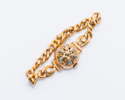 null Bracelet montre de dame en or jaune 18 carats (750 millièmes) formé d’une chaîne...