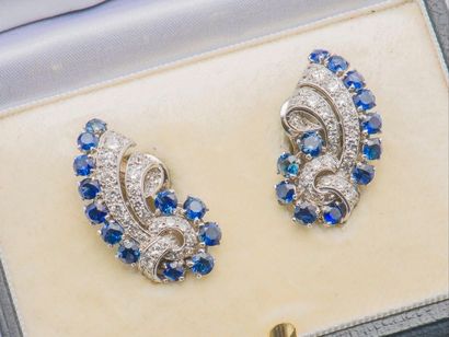 GARRARD London Pair of volutes lapel clips in 18-carat (750 thousandths) white gold...