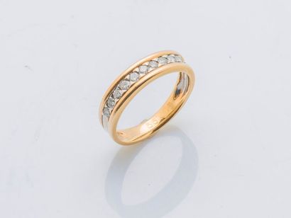 null Half wedding band in 18-carat (750 thousandths) yellow gold set with brilliant-cut...