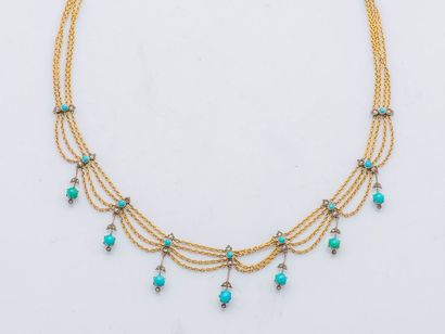 null Drapery necklace in 14 karat yellow gold (585 thousandths) and silver (925 thousandths)...