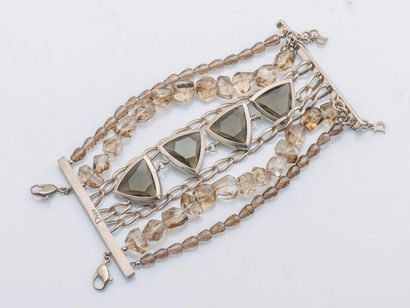 DIOR vers 2000 Bracelet sept rangs de chaînes en métal et perles de résine translucide...