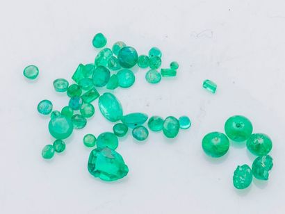 null Set of emeralds on paper in oval, rectangular, round, pear and pearl sizes,...
