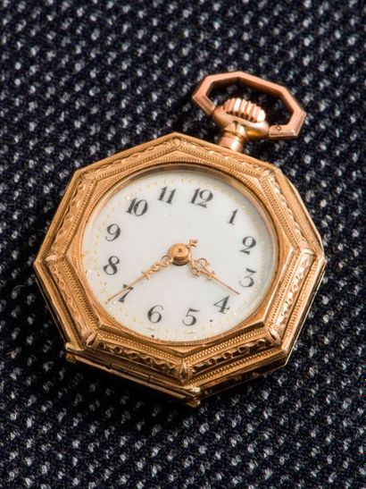 null Octagonal neck watch in 14-carat yellow gold (585 thousandths). The guilloché...