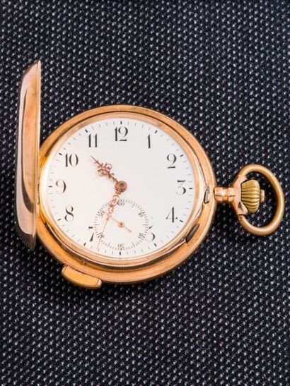 null 14 carat (585 thousandths) yellow gold ringing soapy pocket watch. The background...
