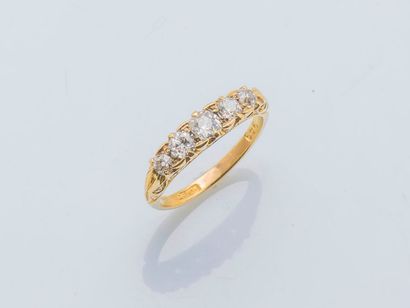 null Bague jarretière en or jaune 18 carats (750 millièmes) sertie d’une ligne de...