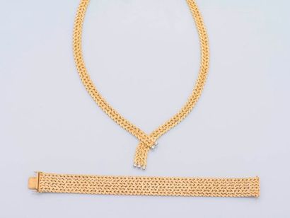 null Parure en or jaune 18 carats (750 millièmes) comprenant un collier ras de cou...