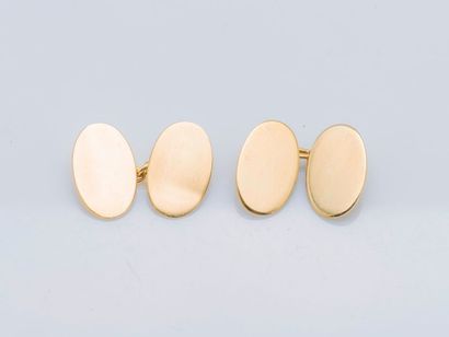 null Paire de boutons de manchettes en or jaune 18 carats (750 millièmes) ornés de...