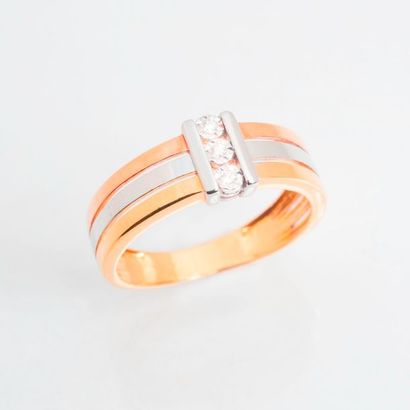 null 9 carat (375 thousandths) yellow, pink and white gold band ring set with three...