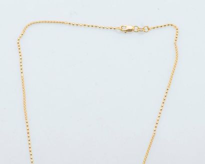null Fancy link chain and character pendants in 18 carat yellow gold (750 thousandths)...