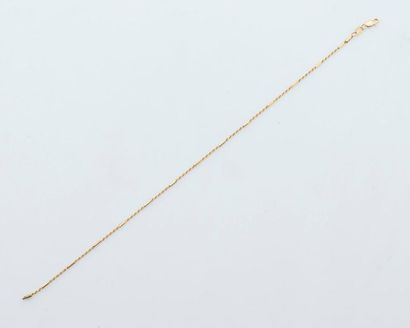 null Bracelet de cheville en or jaune 18 carats (750 millièmes) formé d'une chaine...