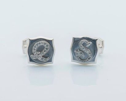 ROGER DUBUIS Pair of cufflinks in 18 carat white gold (750 thousandths) with scalloped...