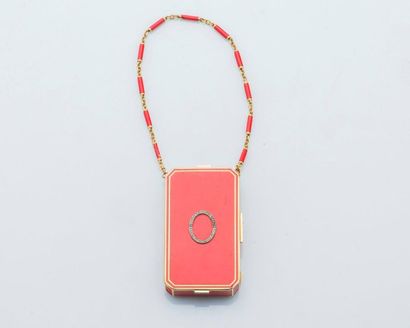 null Vanity case in 18 carat yellow gold (750 thousandths) red enamel and enhanced...