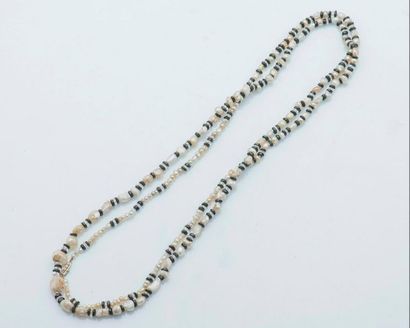 null Long necklace made of irregular fine pearls of sea water and fresh water alternated...