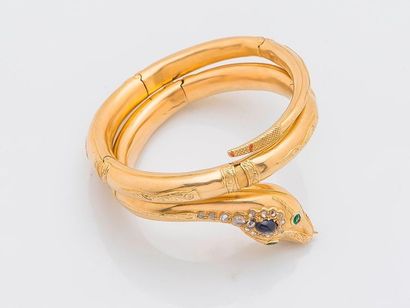 null Bracelet serpent articulé en or jaune 18 carats (750 millièmes) à décor ciselé,...
