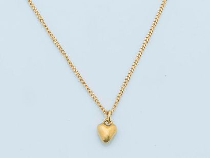 null Chain and heart pendant in 18 karat yellow gold (750 thousandths).

Length:...