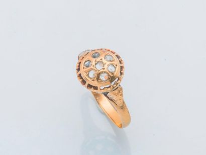 null Ring in 18 karat yellow gold (750 thousandths) set with a rose of seven rose-cut...