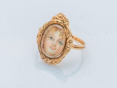 null 18 karat yellow gold (750 thousandths) souvenir ring set with a miniature portrait...
