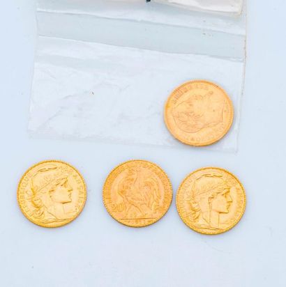 null Lot of four coins of 20 gold francs, one Napoleon coin with a laurelled head...