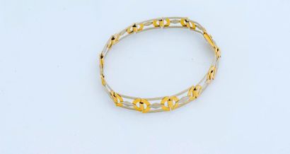 null Bracelet en or jaune et gris 18 carats (750 millièmes) composé d'une succession...