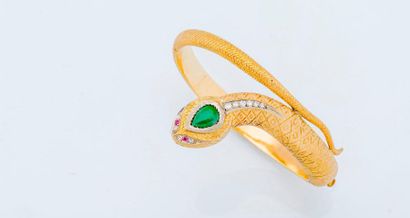 null Bracelet jonc en or jaune 18 carats (750 millièmes) stylisant un serpent à décor...
