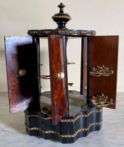 null Cigar cellar music box in the shape of a kiosk made of mahogany veneer and blackened...