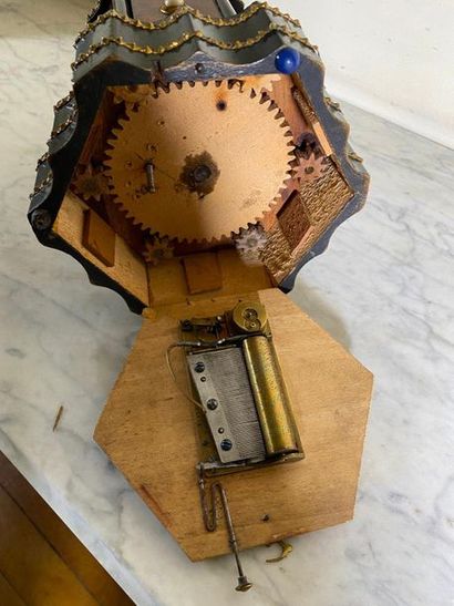 null Cigar cellar music box in the shape of a kiosk made of mahogany veneer and blackened...