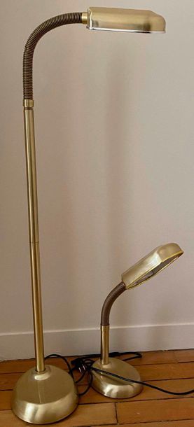 null Set comprising a gold-coloured brushed metal floor lamp (135 cm); a gold-coloured...