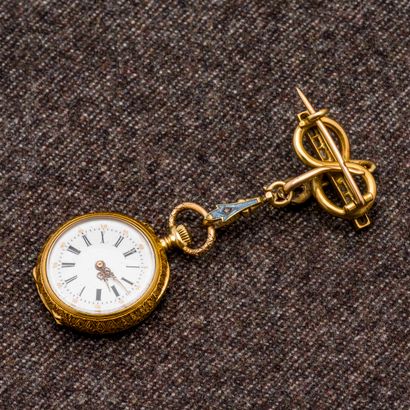 null 18-carat (750 thousandths) yellow gold necklace watch, with its watch brooch...