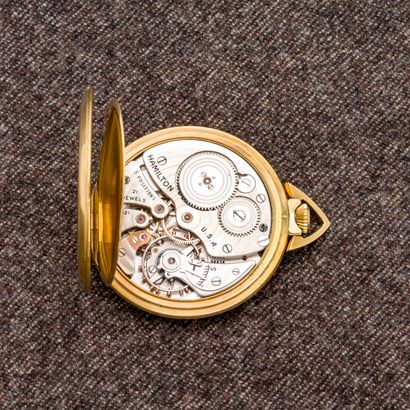 HAMILTON Montre de poche en or jaune 14 carats (585 millièmes) à fond chiffré. Le...