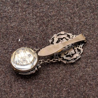 null Chatelaine watch in silver (800 thousandths) with openwork decoration of scrolls...