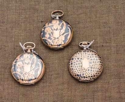 null Set of three soaps MOVADO pocket watches in niello silver comprising : 

- Silver...
