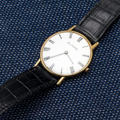 Cadran signé Alexis BARTHELAY Round watch in gilded metal, the back in clipped steel...