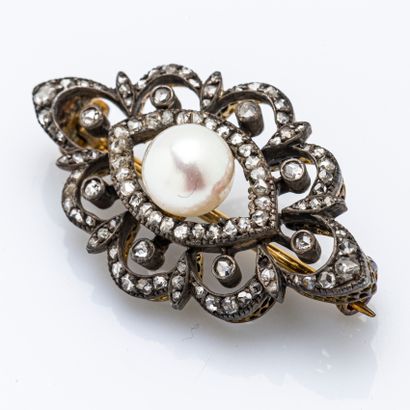 null Brooch in silver (800 thousandths) and 18-carat yellow gold (750 thousandths)...