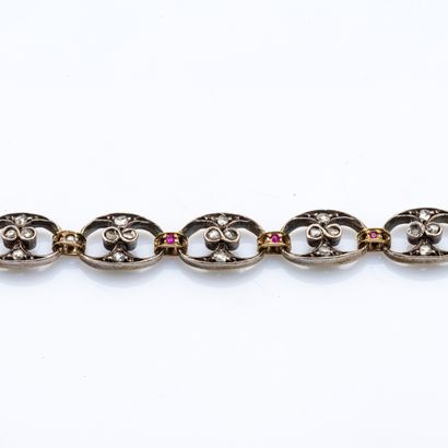 null Bracelet in 18 karat yellow gold (750 thousandths) and silver (800 thousandths)...