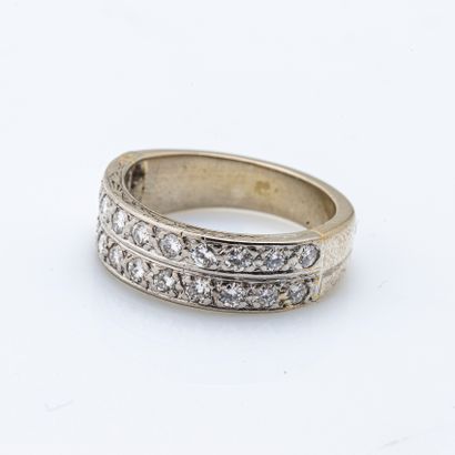 null American half wedding ring in platinum (950 thousandths) set with lines of diamonds....