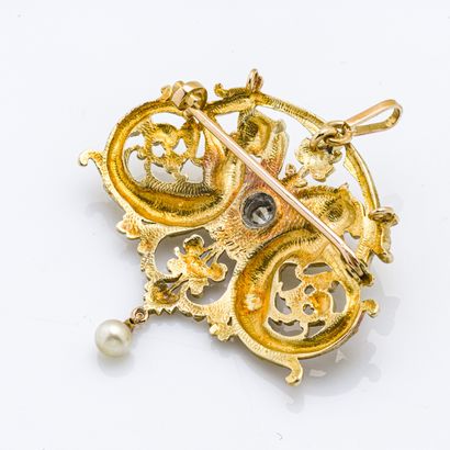 null Broche-pendentif en or jaune 18 carats (750 millièmes) à décor sysmètrique de...