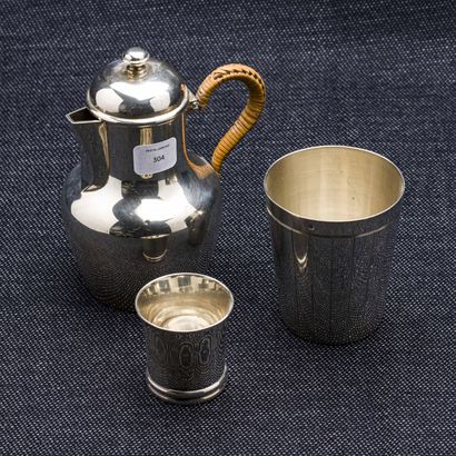 null Silver lot (925 thousandths) comprising a small milk jug with rattan handle...