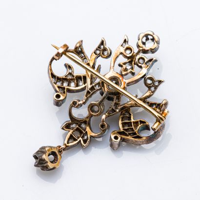 null Brooch in 18K yellow gold (750 thousandths) and silver (800 thousandths) adorned...