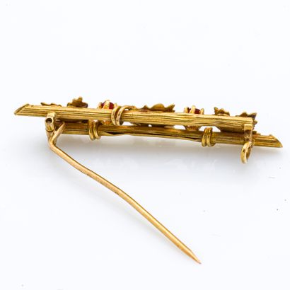 null 18K yellow gold (750 thousandths) barrette brooch stylizing a vase, set with...