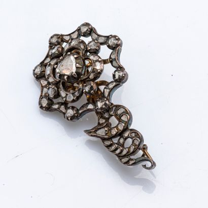 null Brooch in 14 carat yellow gold (585 thousandths) and silver (800 thousandths)...