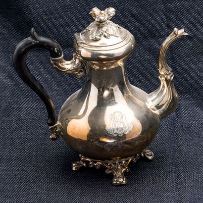 null Silver teapot (925 thousandths) with a figured decoration resting on an openwork...