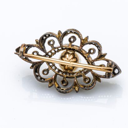 null Brooch in silver (800 thousandths) and 18-carat yellow gold (750 thousandths)...