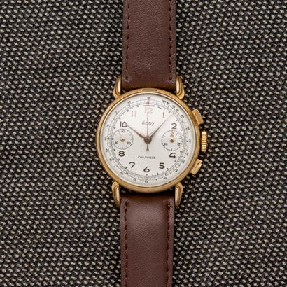 KODY Montre bracelet chronographe en or jaune 18 carats (750 millièmes) à fond clippé....