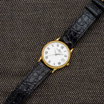 BAUME & MERCIER Extra-flat wristwatch in 18-carat yellow gold (750 thousandths)....